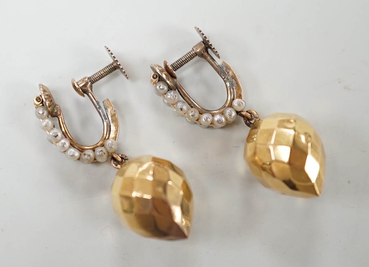 A pair of Victorian yellow metal and seed pearl 'facetted' drop ear clips, overall 34mm, gross weight 5.2 grams.